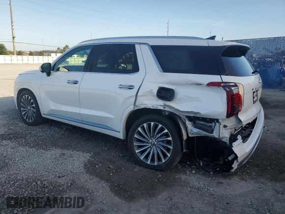2024 Hyundai Palisade Calligraphy z VIN KM8R7DGE6RU715328, wystawiony jako Copart lot #51831285 z przebiegiem 18 721 mil mil oraz Nie do naprawy • Non repairable. Historia ofert i sprzedaży dostępna na DreamBid. Obrazek 2.