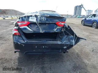 2018 Toyota Camry LE with VIN 4T1B11HK5JU076028, listed as a IAAI auction lot 41989266 with 215,235 mi miles. Bid and sale history available at carsss.com. Image 16.