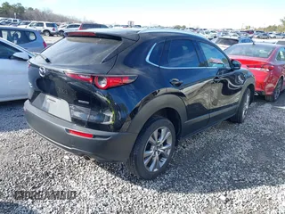 2023 Mazda CX-30 S Premium with VIN 3MVDMBDM7PM528297, listed as a IAAI auction lot 41637542 with 48,935 mi miles and . Bid and sale history available at DreamBid. Image 4.