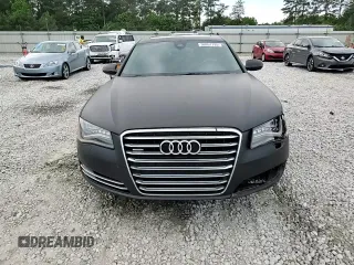 2012 Audi A8 с VIN WAURVAFD4CN017834, выставлен на аукционе Copart как лот 56951795 с пробегом 154 564 миль миль и Списание • Salvage title. История ставок и продаж доступна на DreamBid. Изображение 13.