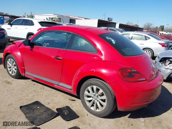 2016 Volkswagen Beetle Coupe 1.8T Wolfsburg Edition with VIN 3VWF17AT7GM608322, listed as a IAAI auction lot 41395323 with 112,054 mi miles. Bid and sale history available at carsss.com. Image 3.