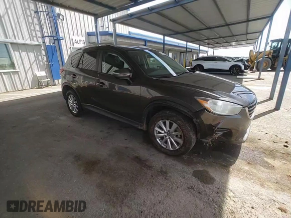 2016 Mazda CX-5 Touring z VIN JM3KE2CY4G0805072, wystawiony jako Copart lot #58435535 z przebiegiem 146 323 mil mil oraz Szkoda całkowita • Salvage title. Historia ofert i sprzedaży dostępna na DreamBid. Obrazek 13.