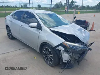 2017 Toyota Corolla L z VIN 5YFBURHE4HP732912, wystawiony jako IAAI lot #42451597 z przebiegiem 73 901 mil mil oraz . Historia ofert i sprzedaży dostępna na DreamBid. Obrazek 1.