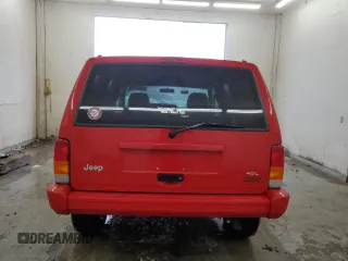 1998 Jeep Cherokee Sport with VIN 1J4FJ68S7WL148034, listed as a Copart auction lot 52436475 with 80,239 mi miles and Salvage Title. Bid and sale history available at carsss.com. Image 6.