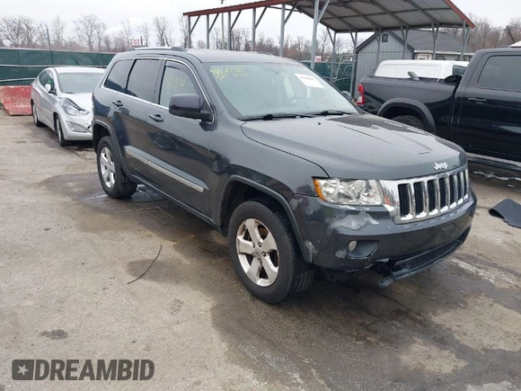 2013 Jeep Grand Cherokee Laredo with VIN 1C4RJFAG9DC506238, listed as a IAAI auction lot 41800981 with 172,676 mi miles. Bid and sale history available at carsss.com. Image 1.