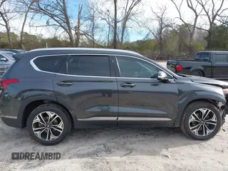 2020 Hyundai Santa Fe Limited with VIN 5NMS53AA2LH301974, listed as a IAAI auction lot 41614588 with 104,621 mi miles. Bid and sale history available at carsss.com. Image 14.