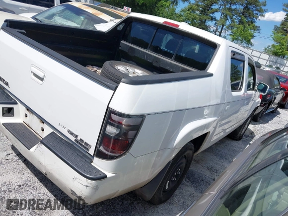 2006 Honda Ridgeline RTL z VIN 2HJYK16506H512654, wystawiony jako IAAI lot #42245264 z przebiegiem 303 551 mil mil oraz . Historia ofert i sprzedaży dostępna na DreamBid. Obrazek 4.