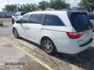 2012 Honda Odyssey EX-L z VIN 5FNRL5H61CB032353, wystawiony jako IAAI lot #42471691 z przebiegiem 186 257 mil mil oraz . Historia ofert i sprzedaży dostępna na DreamBid. Obrazek 3.