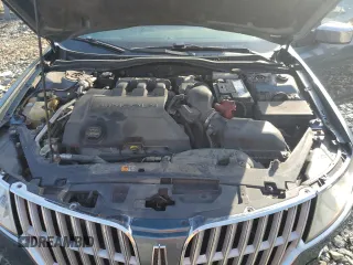 2012 Lincoln MKZ z VIN 3LNHL2GCXCR827302, wystawiony jako Copart lot #70519604 z przebiegiem 150 416 mil mil oraz Szkoda całkowita • Salvage title. Historia ofert i sprzedaży dostępna na DreamBid. Obrazek 11.