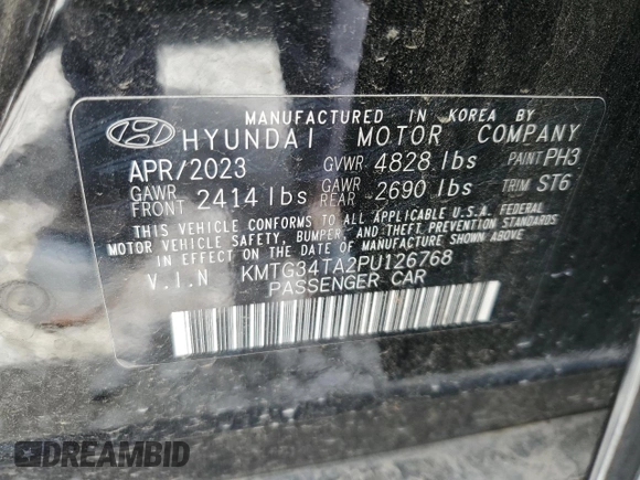 2023 Genesis G70 2.0T with VIN KMTG34TA2PU126768, listed as a Copart auction lot 56201094 with 11,556 mi miles and Salvage Title. Bid and sale history available at DreamBid. Image 12.