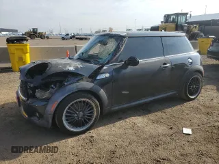 2009 MINI Hardtop S with VIN WMWMF73599TT94509, listed as a Copart auction lot 53495645 with Not provided miles and Salvage title. Bid and sale history available at DreamBid. Image 1.