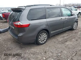 2015 Toyota Sienna Ltd with VIN 5TDDK3DCXFS100341, listed as a IAAI auction lot 41245558 with 114,854 mi miles. Bid and sale history available at carsss.com. Image 4.