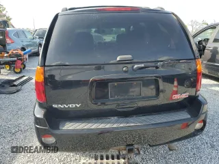 2006 GMC Envoy SLE z VIN 1GKDS13S062176000, wystawiony jako Copart lot #57672995 z przebiegiem 161 455 mil mil oraz Szkoda całkowita • Salvage title. Historia ofert i sprzedaży dostępna na DreamBid. Obrazek 6.
