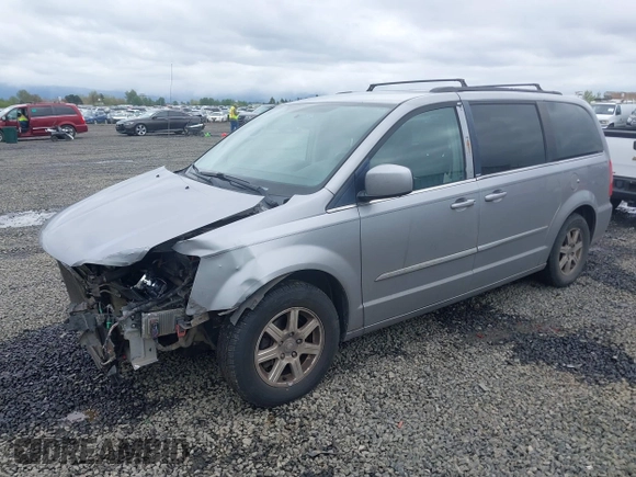 2013 Chrysler Town & Country Touring with VIN 2C4RC1BG2DR656629, listed as a IAAI auction lot 42024459 with 209,472 mi miles and . Bid and sale history available at DreamBid. Image 2.