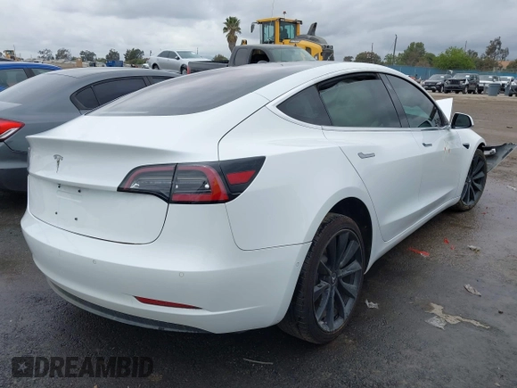 2018 Tesla Model 3 Long Range Battery with VIN 5YJ3E1EA1JF038751, listed as a IAAI auction lot 40553966 with 95,753 mi miles and . Bid and sale history available at DreamBid. Image 4.