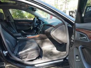 2009 Cadillac CTS RWD w/1SB with VIN 1G6DU57V590105458, listed as a IAAI auction lot 42139093 with 105,983 mi miles. Bid and sale history available at carsss.com. Image 5.
