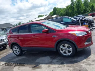 2016 Ford Escape SE z VIN 1FMCU9GX0GUB51525, wystawiony jako IAAI lot #42237629 z przebiegiem 76 616 mil mil oraz . Historia ofert i sprzedaży dostępna na DreamBid. Obrazek 13.