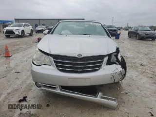 2010 Chrysler Sebring Touring with VIN 1C3BC5ED0AN104523, listed as a Copart auction lot 46631675 with 58,029 mi miles and Salvage Title. Bid and sale history available at DreamBid. Image 5.
