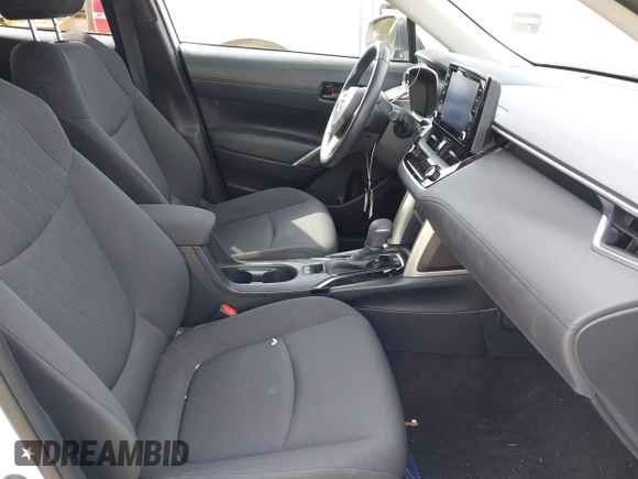 2022 Toyota Corolla Cross LE with VIN 7MUBAAAG6NV021369, listed as a IAAI auction lot 42282685 with 37,863 mi miles and . Bid and sale history available at DreamBid. Image 5.