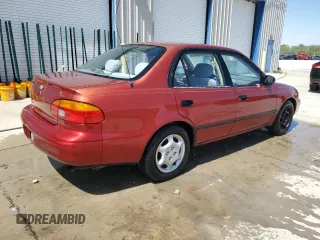 2001 Chevrolet Prizm z VIN 1Y1SK52861Z437836, wystawiony jako Copart lot #54050565 z przebiegiem 138 800 mil mil oraz Szkoda całkowita • Salvage title. Historia ofert i sprzedaży dostępna na DreamBid. Obrazek 3.
