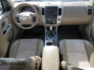 2005 Mercury Mariner Luxury z VIN 4M2YU56195DJ03528, wystawiony jako Copart lot #83315034 z przebiegiem 118 696 mil mil oraz Szkoda całkowita • Salvage title. Historia ofert i sprzedaży dostępna na DreamBid. Obrazek 8.