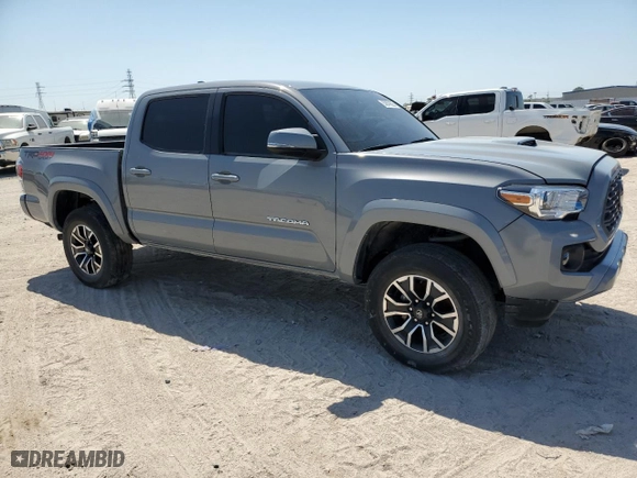 2021 Toyota Tacoma 4WD SR with VIN 3TMCZ5AN2MM436040, listed as a Copart auction lot 52879625 with 27,244 mi miles and Salvage Title. Bid and sale history available at carsss.com. Image 4.
