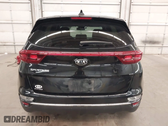 2020 Kia Sportage LX with VIN KNDPMCACXL7804797, listed as a IAAI auction lot 42011299 with 49,793 mi miles and . Bid and sale history available at carsss.com. Image 17.