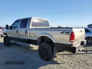 2000 Ford Super Duty F-250 XL with VIN 1FTNW21S9YEA79229, listed as a Copart auction lot 79939304 with 276,795 mi miles and Salvage Title. Bid and sale history available at carsss.com. Image 2.