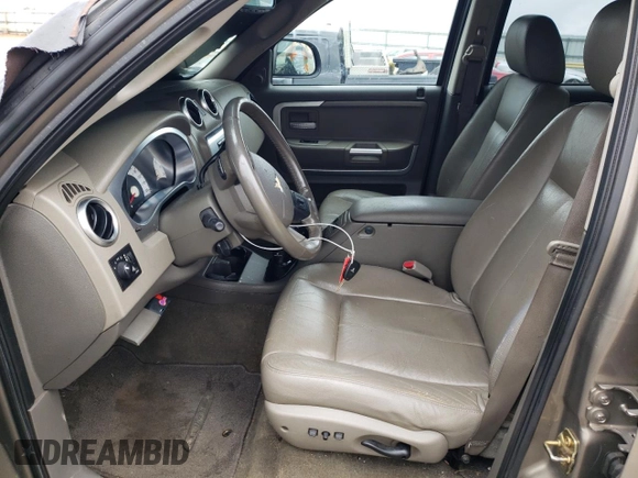 2006 Mitsubishi Raider z VIN 1Z3HT48N36S540902, wystawiony jako Copart lot #73397504 z przebiegiem 126 311 mil mil oraz Czysty tytuł • Clean title. Historia ofert i sprzedaży dostępna na DreamBid. Obrazek 7.