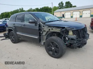 2011 Jeep Grand Cherokee Laredo with VIN 1J4RR4GG1BC610654, listed as a Copart auction lot 58828015 with 155,959 mi miles and Salvage title. Bid and sale history available at DreamBid. Image 4.