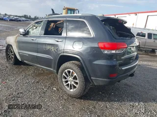 2014 Jeep Grand Cherokee Limited with VIN 1C4RJEBM1EC574629, listed as a IAAI auction lot 41696495 with 1 mi miles. Bid and sale history available at carsss.com. Image 3.