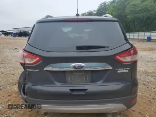2015 Ford Escape Titanium with VIN 1FMCU0J96FUC00683, listed as a Copart auction lot 58345105 with 61,031 mi miles and Salvage title. Bid and sale history available at DreamBid. Image 6.