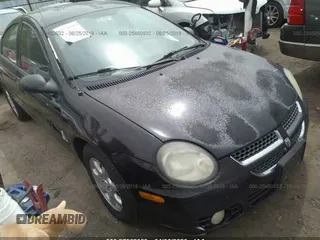2003 Dodge Neon SXT with VIN 1B3ES56C63D251649, listed as a IAAI auction lot 27562059 with 222,302 mi miles. Bid and sale history available at carsss.com. Image 1.