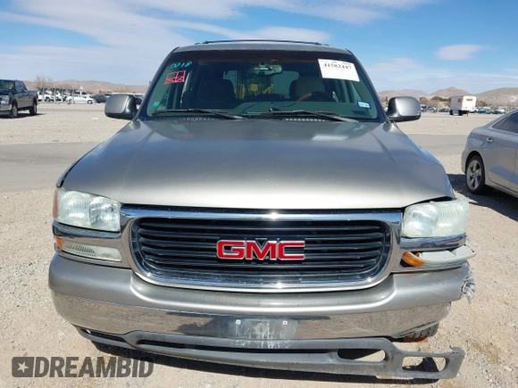 2003 GMC Yukon SLT with VIN 1GKEC13V33R298333, listed as a IAAI auction lot 41582447 with 166,047 mi miles. Bid and sale history available at carsss.com. Image 12.