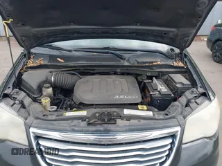 2012 Chrysler Town & Country Touring with VIN 2C4RC1BG1CR312532, listed as a IAAI auction lot 42194864 with 197,609 mi miles and . Bid and sale history available at DreamBid. Image 10.