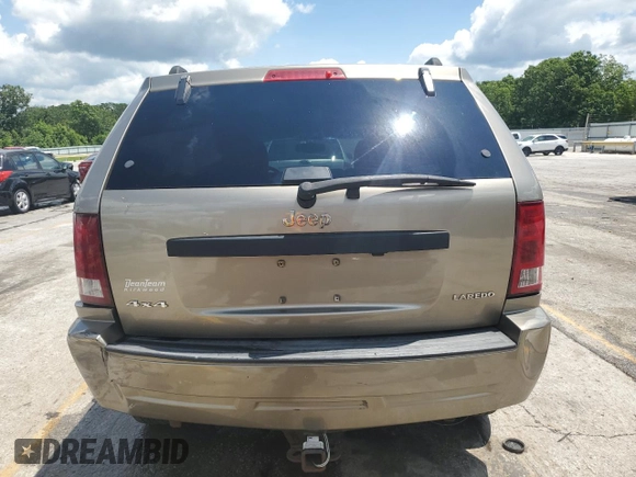 2005 Jeep Grand Cherokee Laredo with VIN 1J4HR48N65C608296, listed as a Copart auction lot 58862875 with 168,421 mi miles and Salvage title. Bid and sale history available at DreamBid. Image 6.
