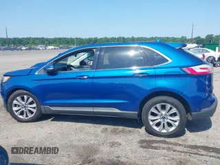 2020 Ford Edge Titanium with VIN 2FMPK4K96LBA55482, listed as a IAAI auction lot 42557716 with 61,509 mi miles and . Bid and sale history available at DreamBid. Image 13.