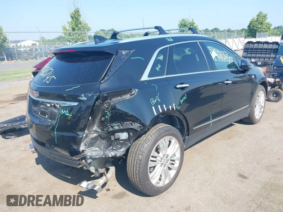 2018 Cadillac XT5 Premium Luxury AWD with VIN 1GYKNFRS1JZ195373, listed as a IAAI auction lot 42583745 with 64,978 mi miles and . Bid and sale history available at DreamBid. Image 4.
