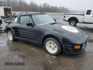 1977 Porsche 911 with VIN 9117212463, listed as a Copart auction lot 46277515 with Not provided miles and Clean title. Bid and sale history available at DreamBid. Image 4.