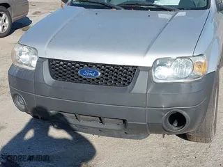 2006 Ford Escape XLT with VIN 1FMCU03166KB47650, listed as a IAAI auction lot 41529751 with 153,962 mi miles. Bid and sale history available at carsss.com. Image 6.