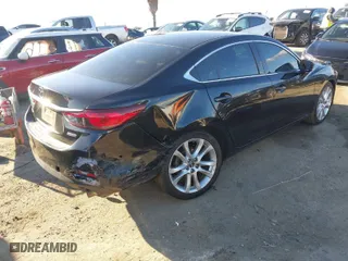 2017 Mazda Mazda6 Touring with VIN JM1GL1V56H1118933, listed as a IAAI auction lot 41759801 with 112,668 mi miles. Bid and sale history available at carsss.com. Image 4.