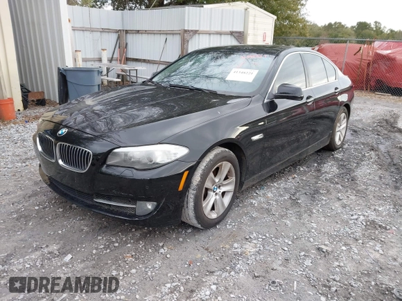 2012 BMW 5 Series 528i with VIN WBAXG5C51CDY28325, listed as a IAAI auction lot 41348221 with 125,039 mi miles. Bid and sale history available at carsss.com. Image 2.