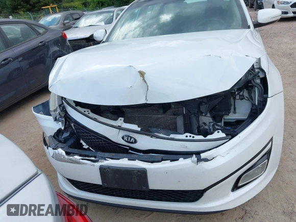 2015 Kia Optima EX with VIN 5XXGN4A77FG497218, listed as a IAAI auction lot 42464839 with 128,355 mi miles and . Bid and sale history available at DreamBid. Image 6.