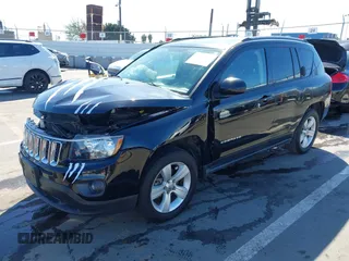 2016 Jeep Compass Latitude with VIN 1C4NJCEB2GD628384, listed as a IAAI auction lot 41752694 with 122,589 mi miles. Bid and sale history available at carsss.com. Image 2.