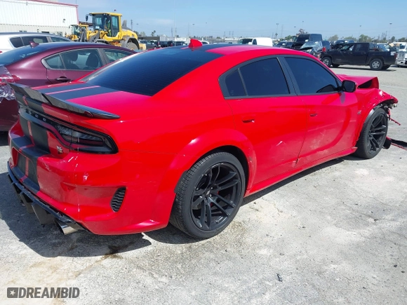 2022 Dodge Charger Scat Pack with VIN 2C3CDXGJ7NH229307, listed as a IAAI auction lot 41808821 with 12,184 mi miles. Bid and sale history available at carsss.com. Image 4.