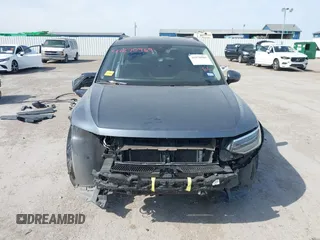 2023 Volkswagen Tiguan S z VIN 3VVRB7AX9PM132401, wystawiony jako IAAI lot #41870969 z przebiegiem 40 533 mil mil oraz . Historia ofert i sprzedaży dostępna na DreamBid. Obrazek 13.