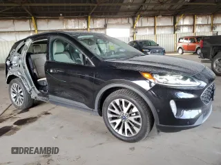 2020 Ford Escape Titanium Hybrid z VIN 1FMCU9DZ2LUB49050, wystawiony jako Copart lot #42517525 z przebiegiem 66 890 mil mil oraz Szkoda całkowita • Salvage title. Historia ofert i sprzedaży dostępna na DreamBid. Obrazek 4.