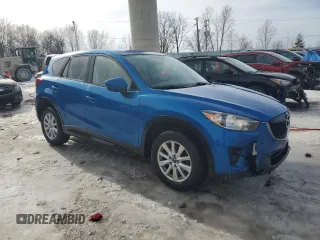 2013 Mazda CX-5 Touring with VIN JM3KE4CE1D0135493, listed as a Copart auction lot 42741765 with 71,467 mi miles and Clean Title. Bid and sale history available at carsss.com. Image 4.