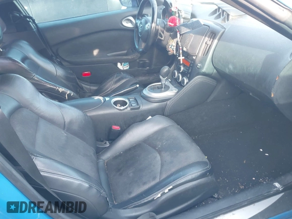 2009 Nissan 370Z Touring with VIN JN1AZ44E39M400201, listed as a IAAI auction lot 41710283 with 245,735 mi miles and . Bid and sale history available at DreamBid. Image 5.