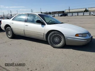 1993 Chrysler Concorde z VIN 2C3EL56T1PH613475, wystawiony jako Copart lot #54610735 z przebiegiem 163 913 mil mil oraz Szkody całkowita. Historia ofert i sprzedaży dostępna na DreamBid. Obrazek 4.